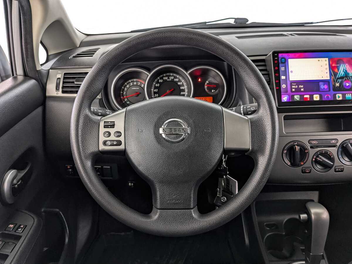 Nissan Tiida, 2013 Фото №22